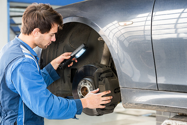 What Causes Brakes to Grind When Stopping?